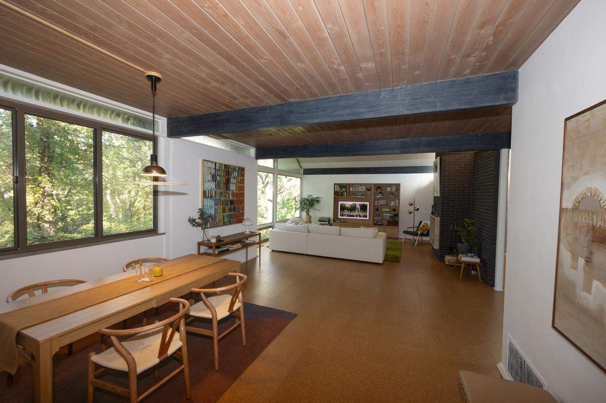 Inside a midcentury home in Kil Mar woods, overlooking a cliff and the woods outside of Mount Hope cemetery.
