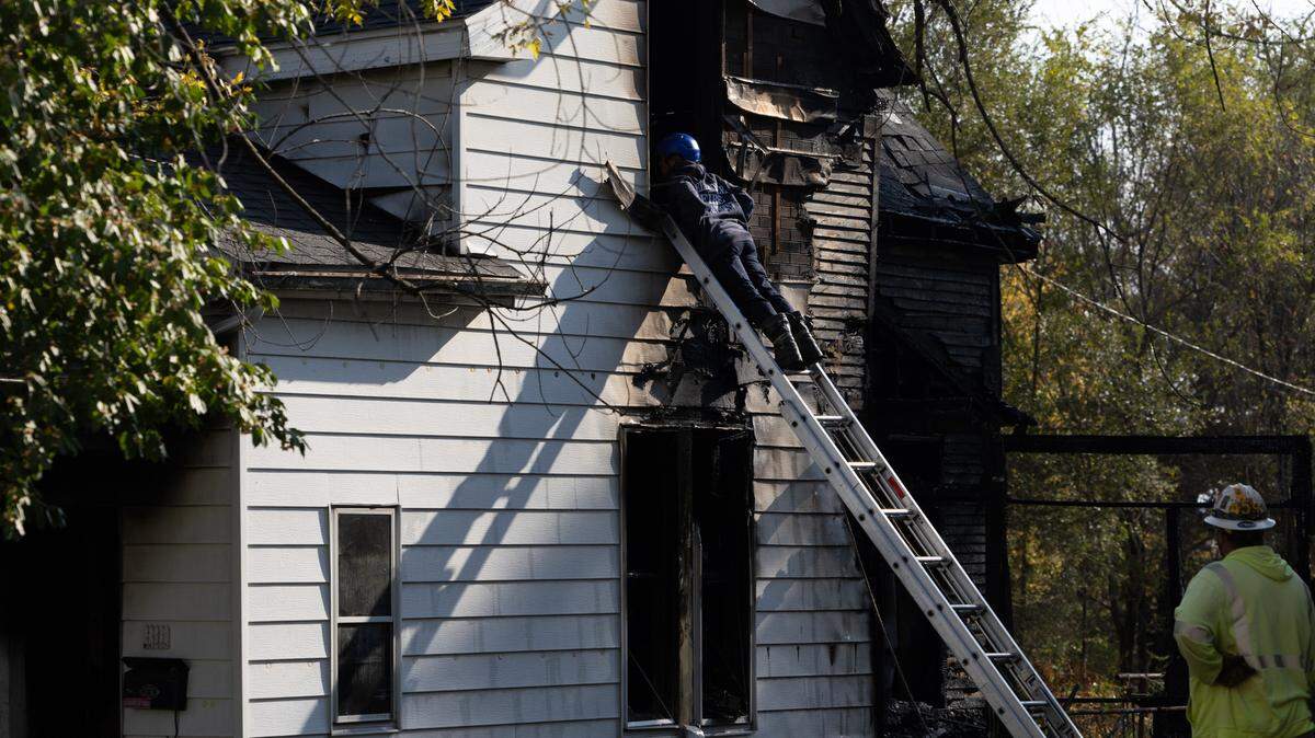 Three people are confirmed dead after an early-morning house fire in Belleville Monday.