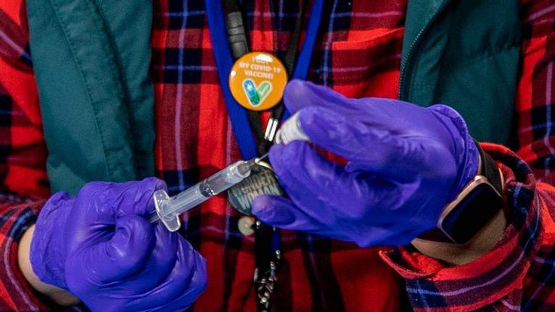 Illinois educators must get COVID shot by Sept. 5, but the logistics aren’t clear yet