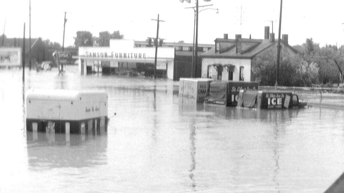 Floodwaters from Richland Creek cover the 700 block of West Main Street in Belleville on June 15, 1957. The flooding was responsible for more than $3 million of damage in Belleville.