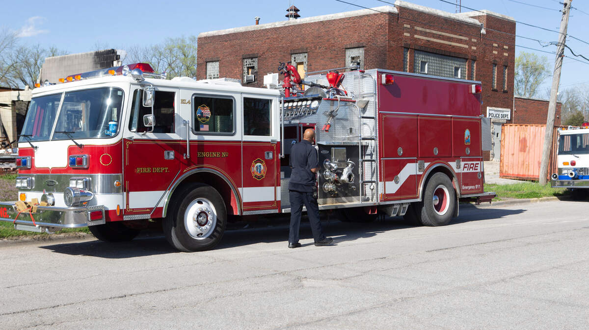 Washington Park fire chief Preston Green walks past a fire truck in 2022.