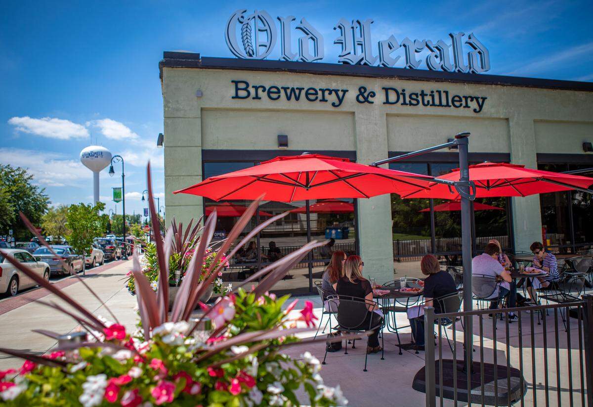 Old Herald Brewery & Distillery in Collinsville, shown here in the summer, is selling food and spirits on a carryout basis. Each customer gets a free bottle of hand sanitizer.
