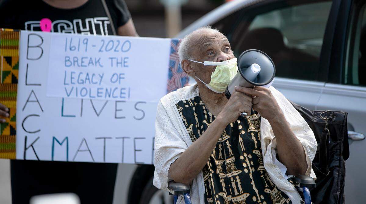 East St. Louis civil rights leader, activist and historian Reginald Petty, 84, shares some of his experiences with Black Lives Matter protesters outside of East St. Louis city hall. Petty marched with Dr. Martin Luther King Jr., worked with Nelson Mandela and was arrested 36 times in one year in Jackson, Mississippi when he was working on voter rights.