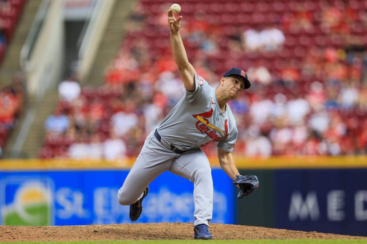 May 29, 2024; Cincinnati, Ohio, USA; St. Louis Cardinals relief pitcher Ryan Helsley (56) pitches against the Cincinnati Reds in the ninth inning at Great American Ball Park. Mandatory Credit: Katie Stratman-USA TODAY Sports