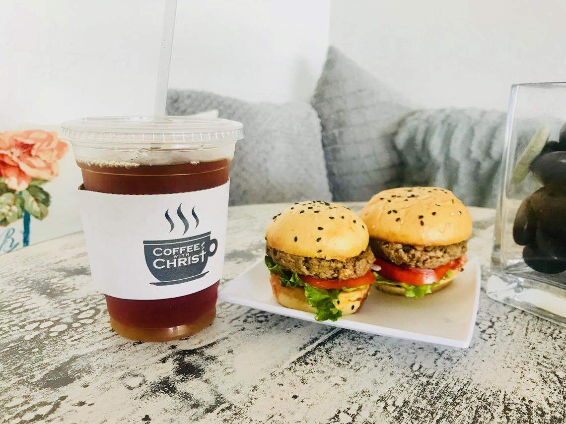 A look at two Impossible Burgers from Coffee with Christ. The plant-based patty contains no animal products, but you wouldn’t know that unless someone told you, the owner says.