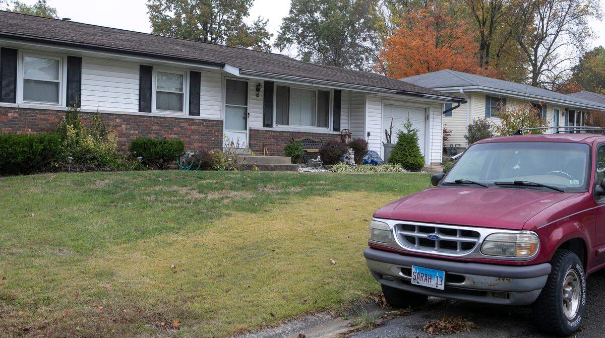 One of Sarah Delashmit’s vehicles is parked outside the Highland home where she reportedly lives with her mother.