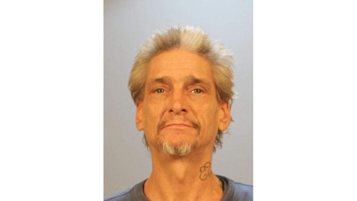 Fayetteville police shot a dog in its yard while searching for Robert Hock, who had arrest warrants from St. Clair County. Hock was in jail on Friday morning.