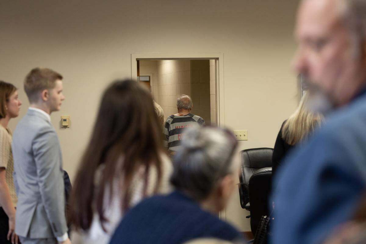 The family of Randy Sperino watch on as Albert L. Zigler, who has been charged in the 1993 murder of Sperino, is escorted out of the court room inside the Madison County Criminal Justice Center and to a detention facility on May 27, 2026.