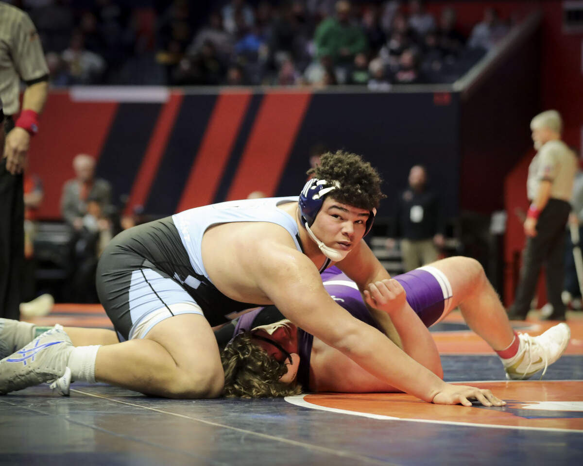 Belleville East’s freshman Jonathan Rulo defeats Hampshire’s Joey Ochoa with a fall at 5:48 in their preliminary match at the 2023 IHSA Individual Wrestling State Finals on Thursday in Champaign.