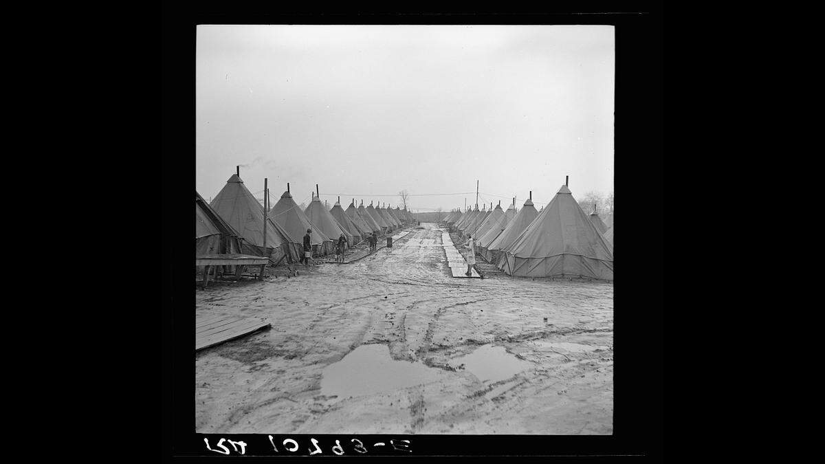 After the Great Flood of 1937, residents of Shawneetown temporarily lived in “Tent City,” a farm that was used to house flood refugees in Gallatin County.