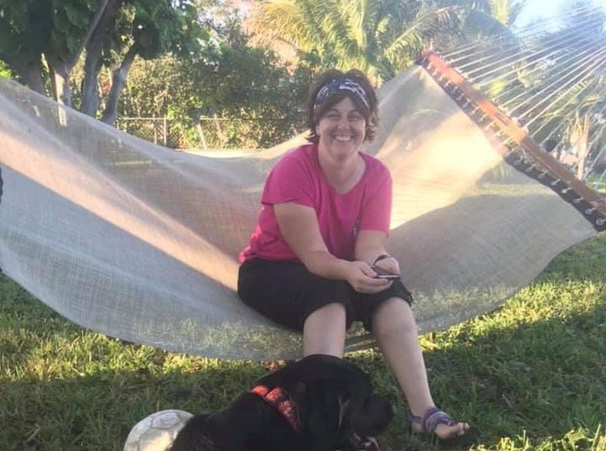 Highland resident Sarah Delashmit sits on a hammock in 2019 while visiting Liz and Brian Hickox, a Rhode Island couple who were staying in Florida.
