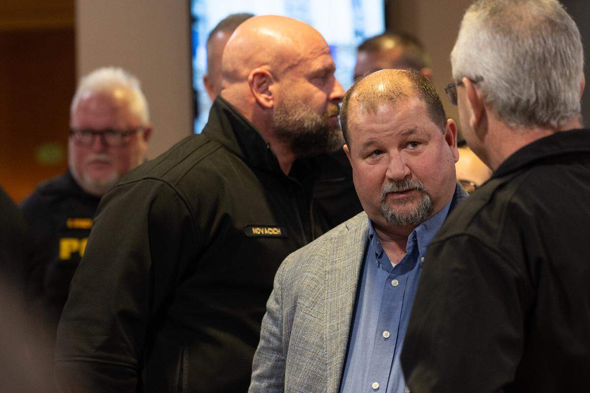 Granite City Mayor Mike Parkinson and retired Granite City police chief Nick Novacich were among those who attended a scheduled hearing Thursday at the Madison County Criminal Justice Center for for DJ W. Marshall, 26, who is accused of shooting and injuring Granite City Police Officer Tyler Timmons.