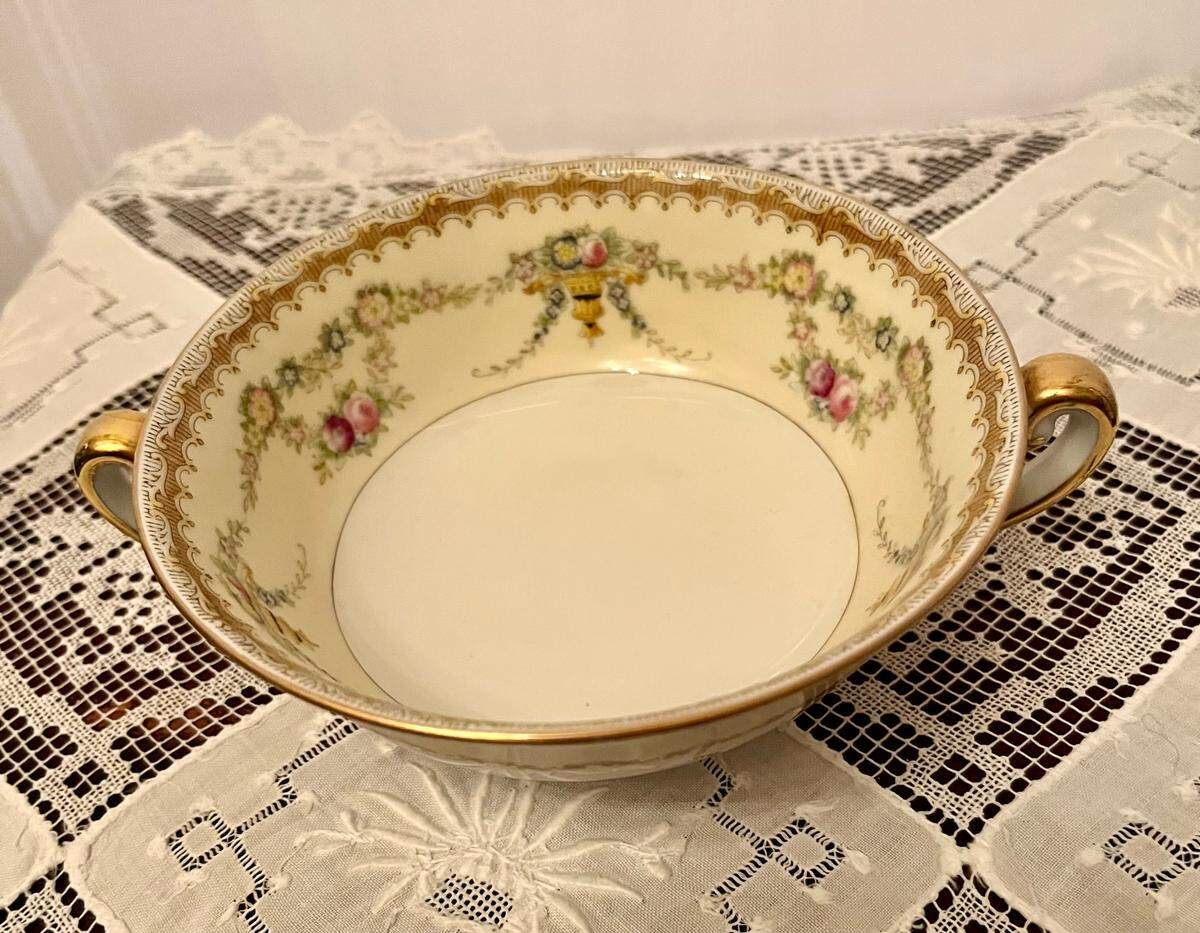 This is another&nbsp;china cream soup bowl.&nbsp;It is 5” in diameter and is 1-3/4” deep with again two small handles with a more elaborate pattern.&nbsp; 