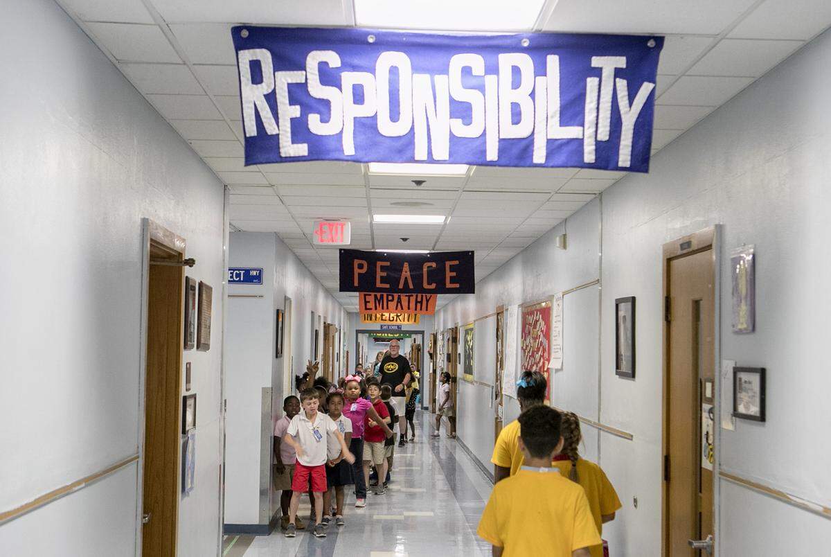 Twelve character words hang in the main hallway at Ellis Elementary School in Belleville.  The school has been designated an Illinois and National School of Character.