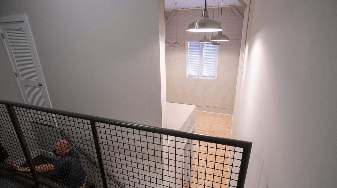 Developers who turned the former Granite City YMCA building into an apartment complex carved five loft-style units out of the former gymnasium. They feature the original brick walls and maple floor.