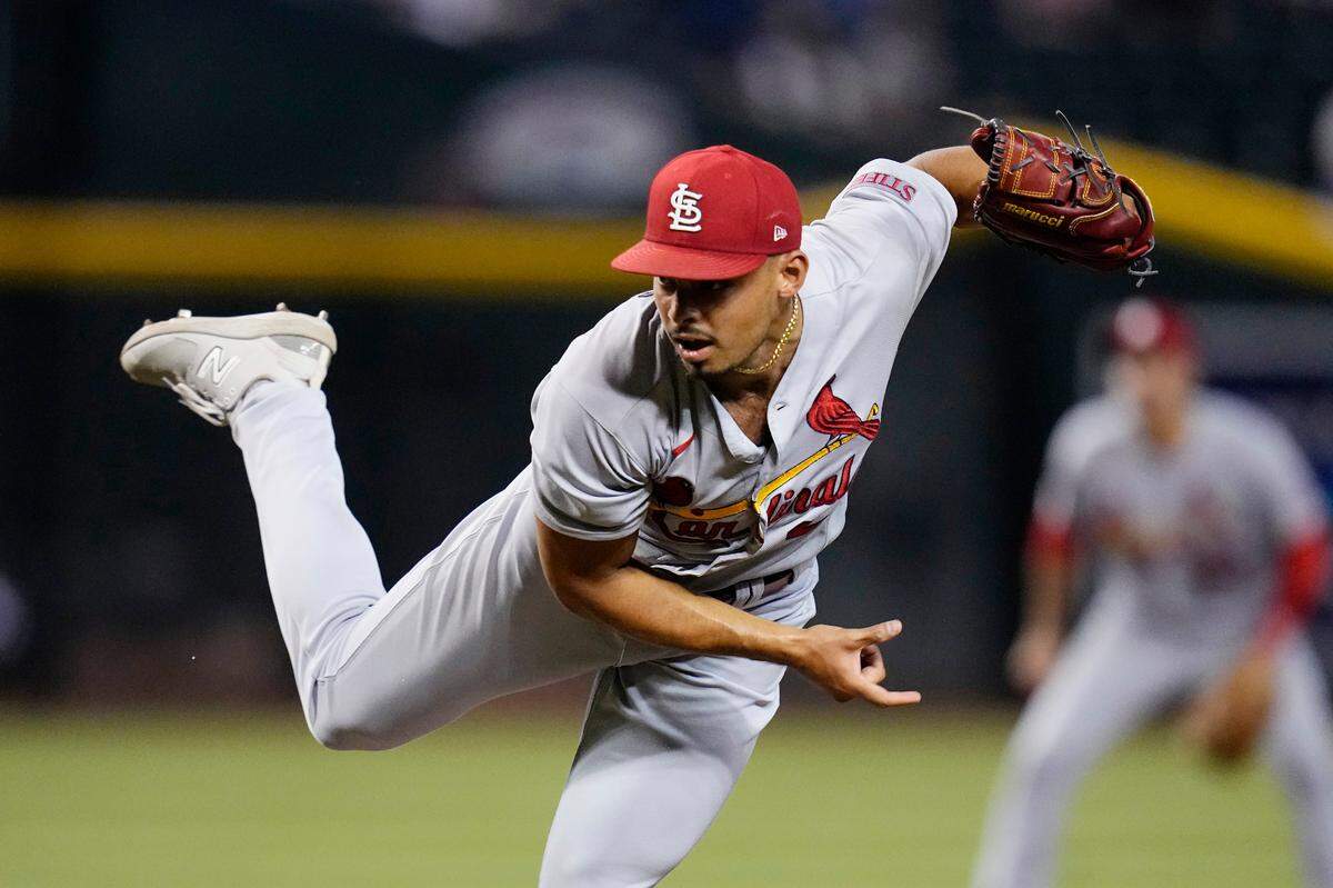 St. Louis Cardinals relief pitcher Jordan Hicks throws against the Arizona Diamondbacks during the ninth inning of a game Monday, July 24, in Phoenix. Hicks, who helped close out a 10-6 win against Arizona, could be a hot commodity at the upcoming MLB trade deadline.