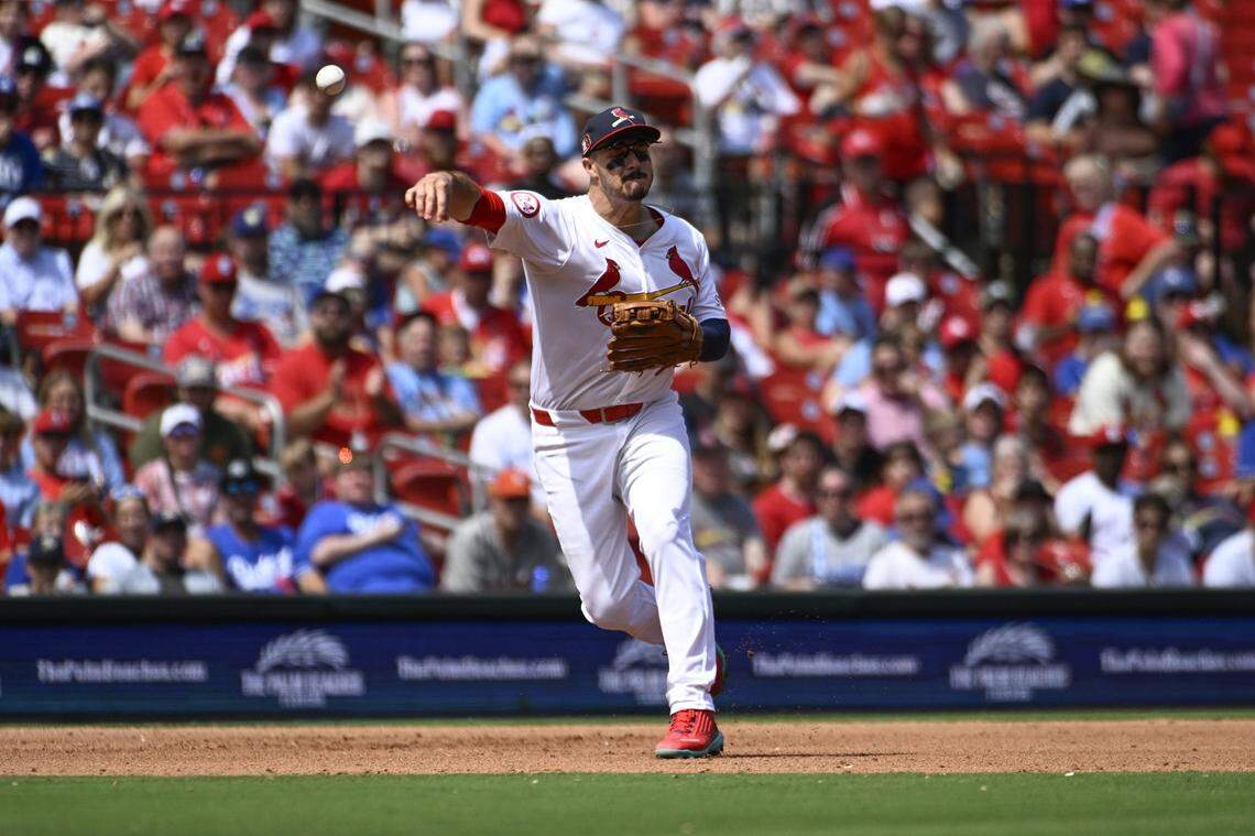 Aug 18, 2024; St. Louis, Missouri, USA; St. Louis Cardinals third baseman Nolan Arenado (28) throws to first for an out against the Los Angeles Dodgers in the fifth inning at Busch Stadium. Mandatory Credit: Joe Puetz-USA TODAY Sports