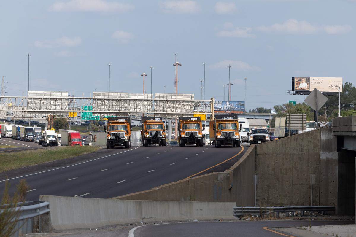 Illinois Department of Transportation trucks block access to southbound Interstate 55 in East St. Louis, Ill. on Sept. 4, 2024, following a fatal motorcycle crash.