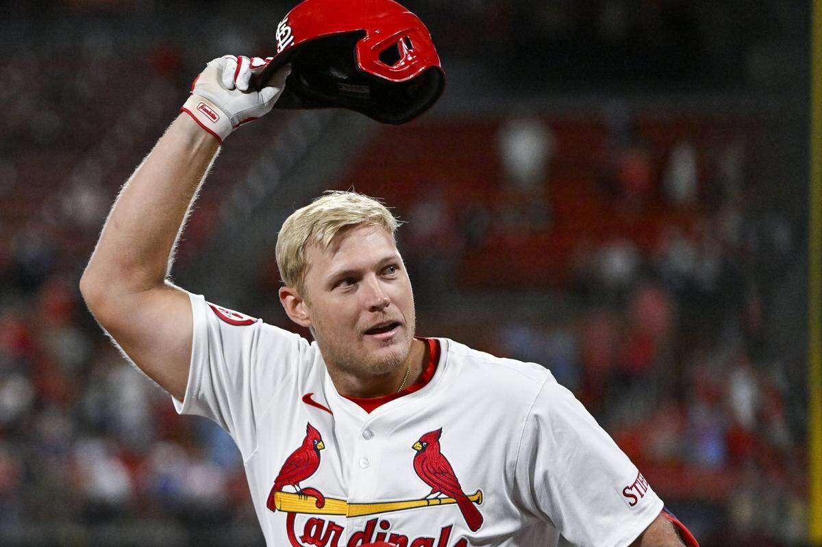 Aug 21, 2024; St. Louis, Missouri, USA;  St. Louis Cardinals pinch hitter Luken Baker (26) salutes the fans as he receives a curtain call after hitting a two run home run against the Milwaukee Brewers during the seventh inning at Busch Stadium. Mandatory Credit: Jeff Curry-USA TODAY Sports