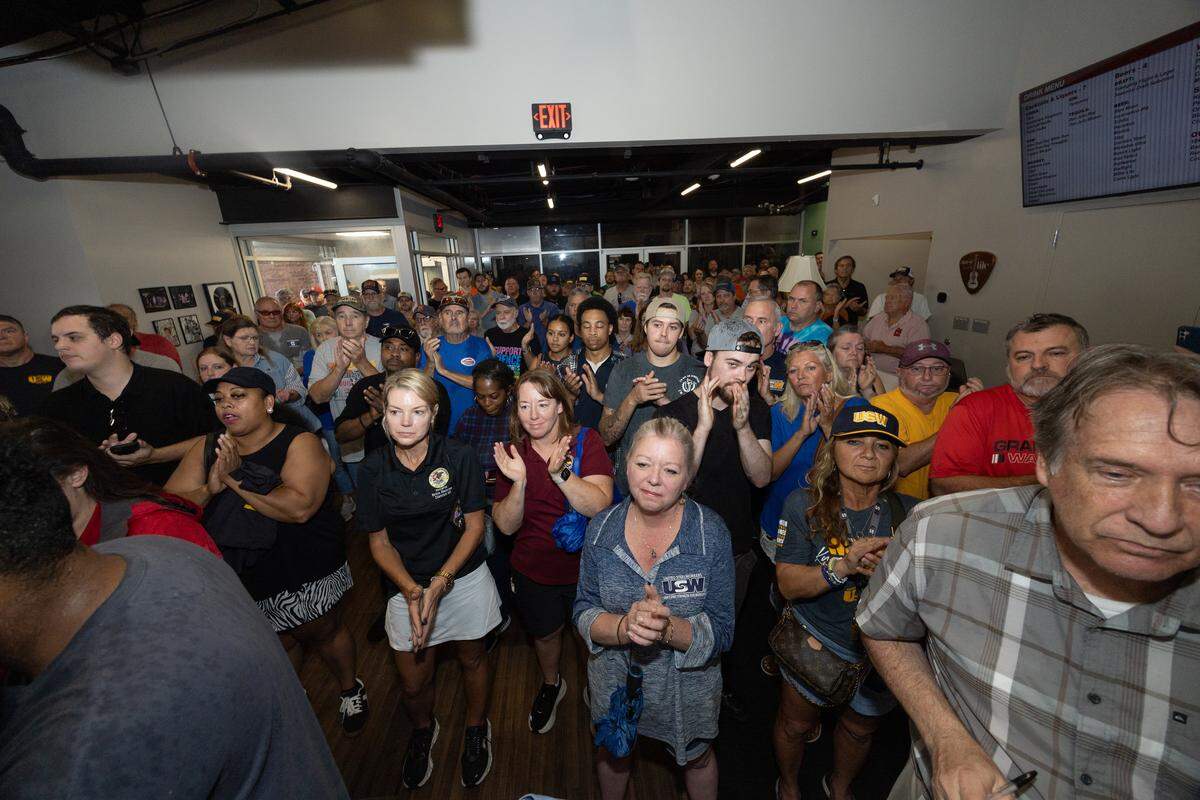 Steelworkers, their families, supporters and politicians applaud at a Granite City rally on Saturday.