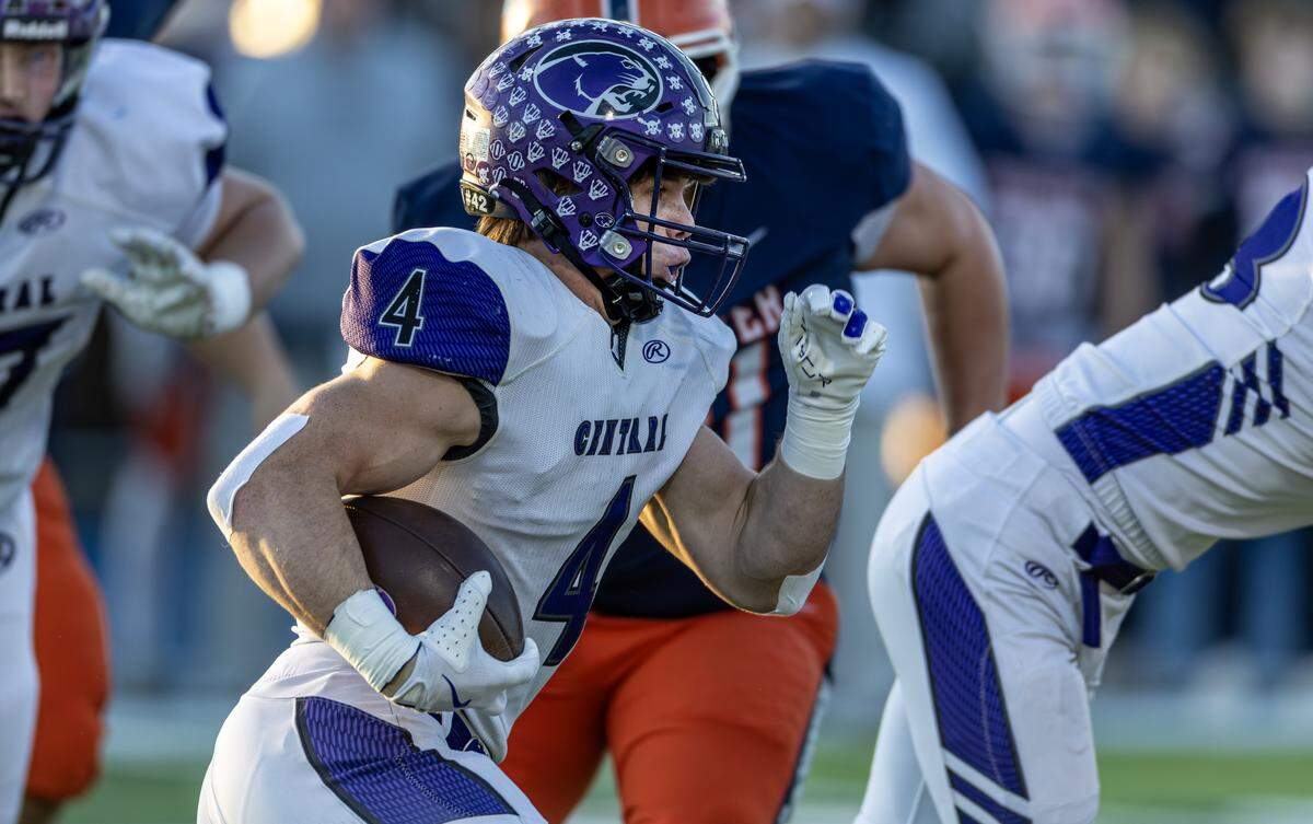 Breese Central senior running back Cole Davis fights for yards against Rochster in an IHSA Class 4A state semifinal Saturday.