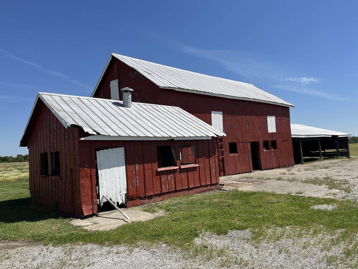 A red livestock barn and adjoining outbuilding are two of the historic structures on a former farm that’s being converted into a new Belleville location of Karla Smith Behavioral Health, which is moving from O’Fallon.