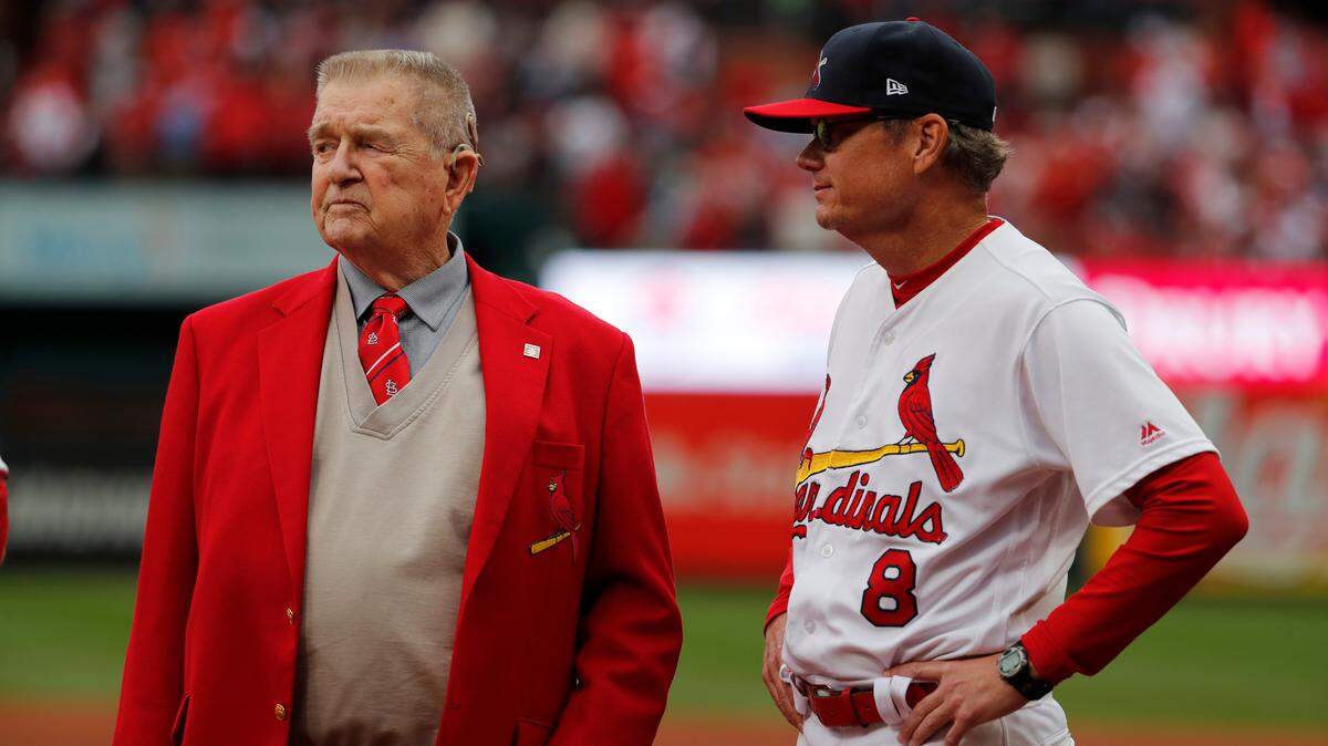Former St. Louis Cardinals manager Whitey Herzog, left, stands with St. Louis Cardinals manager Mike Shildt before the start of Game 3 in a baseball National League Division Series against the Atlanta Braves Oct. 6, 2019, in St. Louis. Herzog, Shildt and Tony La Russa are the only three Cardinals manager to win National League Manager of the Year honors. (AP Photo/Jeff Robrson)