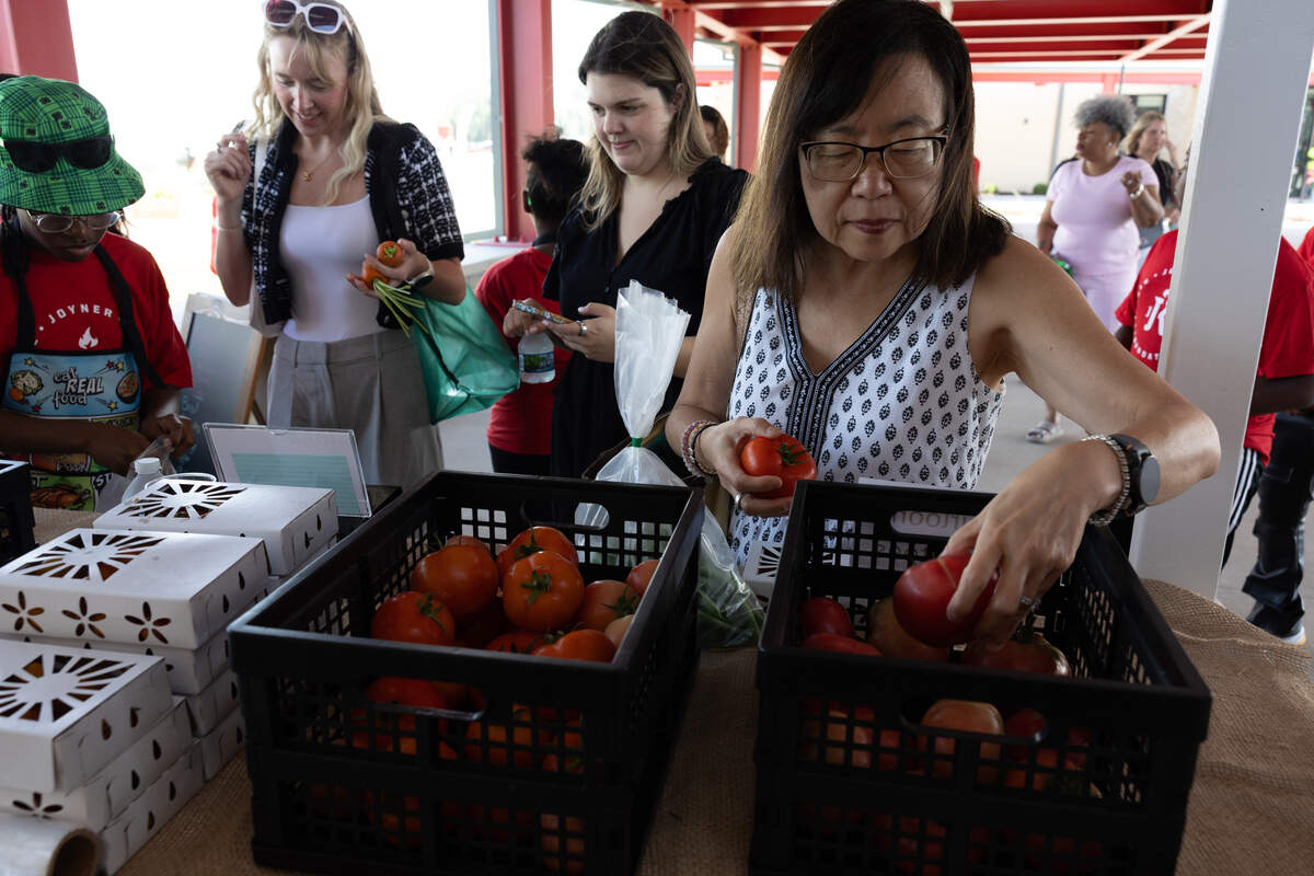 Attendees at opening ceremony for the new Jackie Joyner-Kersee Food, Agriculture, and Nutrition Innovation Center in East St. Louis were treated to a farmer’s market, filled with plants sourced on-site.