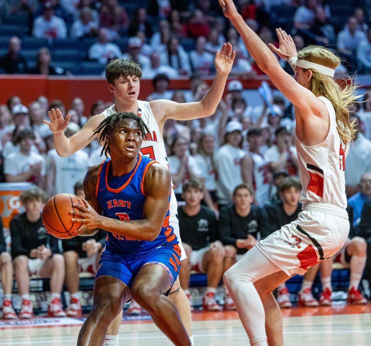 East St. Louis’s Macaleab Rich looks for an opening during Friday’s IHSA Class 3A state semifinal game against Metamora at State Farm Center in Champaign on the campus of the University of Illinois. The Flyers ultimately fell to the Redbirds 50-43.