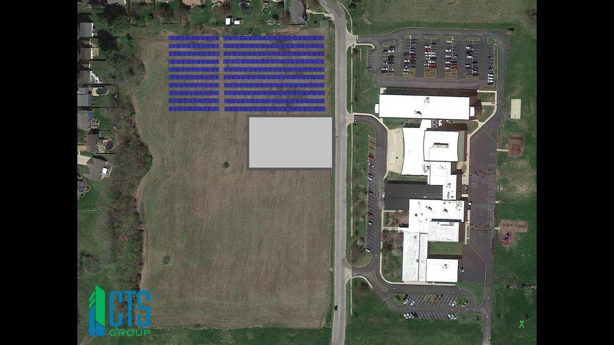 This computer-generated image shows how ground-mounted solar panels will be installed in a former farm field adjacent to C.A. Henning Elementary School in Troy.