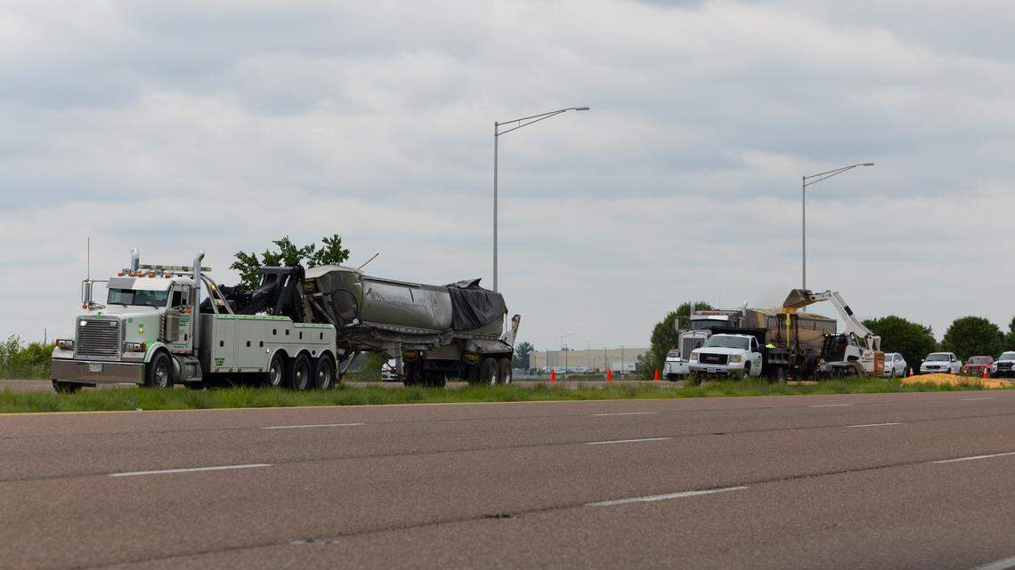 At least one injured, lanes closed after semi rollover on I-255