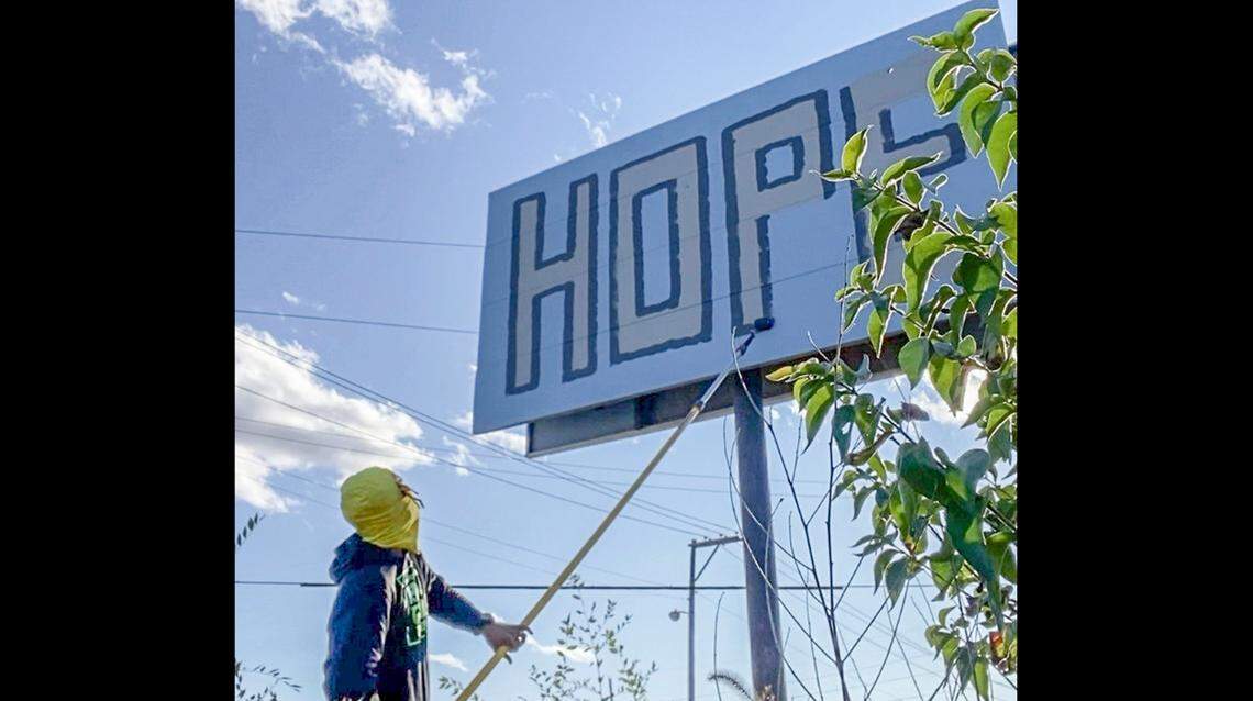 Members of Clean City Coalition have painted many abandoned signs in East St. Louis. The group is bringing residents together to clean up the city.