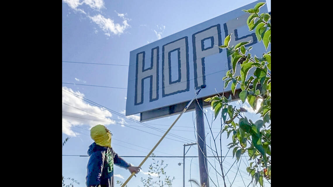 Four young men want to be the answer to East St. Louis trash issue. Community responds