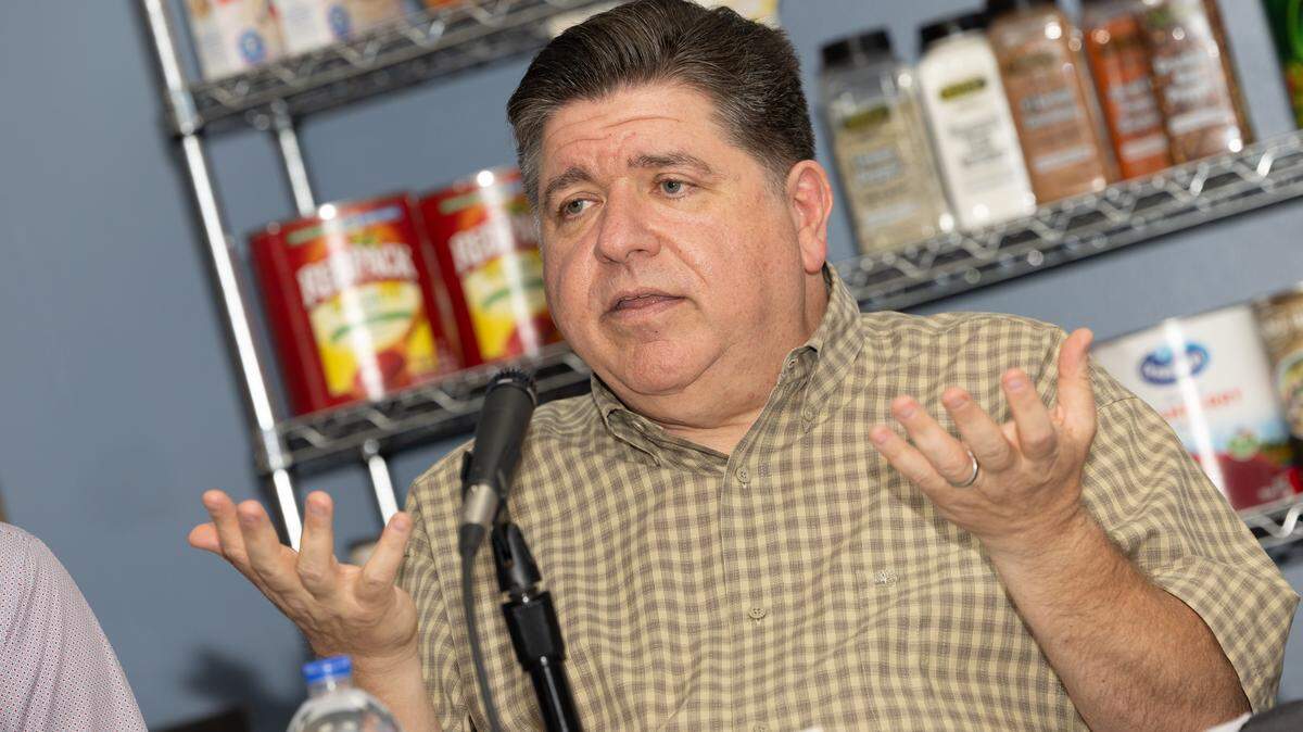 Illinois Gov. JB Pritzker speaks during a news conference Tuesday in East St. Louis to address recent cuts to the SNAP program by the Trump administration.