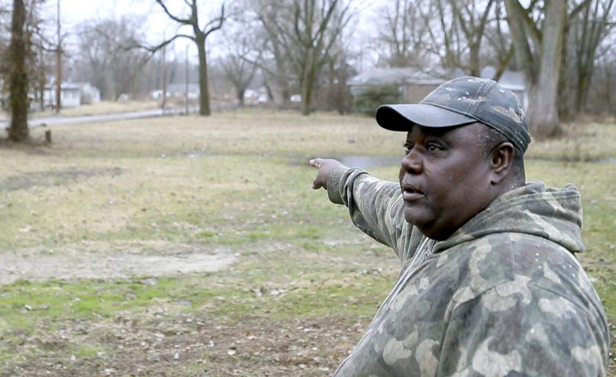 Centreville resident Walter Byrd talks about flooding and sewer issues that he and his neighbors have been battling for years. Byrd lives in the area near Illinois 157 and Lake Drive in Centreville.