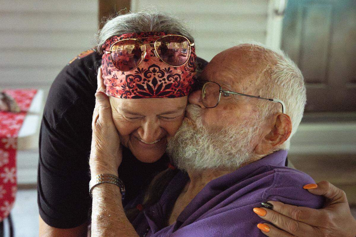 Tom Hensley, 86, kisses his daughter Tina Weber’s cheek before she leaves his house out on Saturday, July 27, 2024, in Sullivan, Missouri.