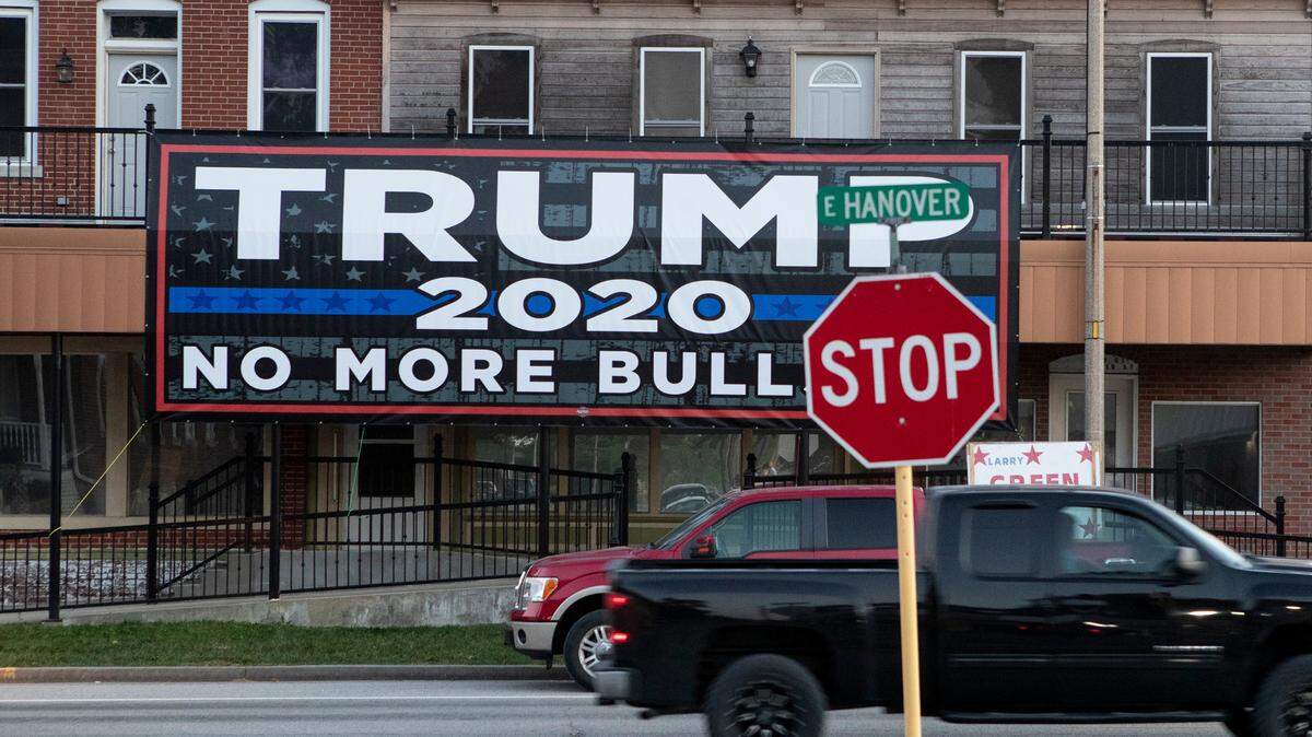 New Baden Mayor Christy Picard is asking a property owner to remove a profanity from the 300-square-foot political sign he has hanging from his building on the town’s main road.