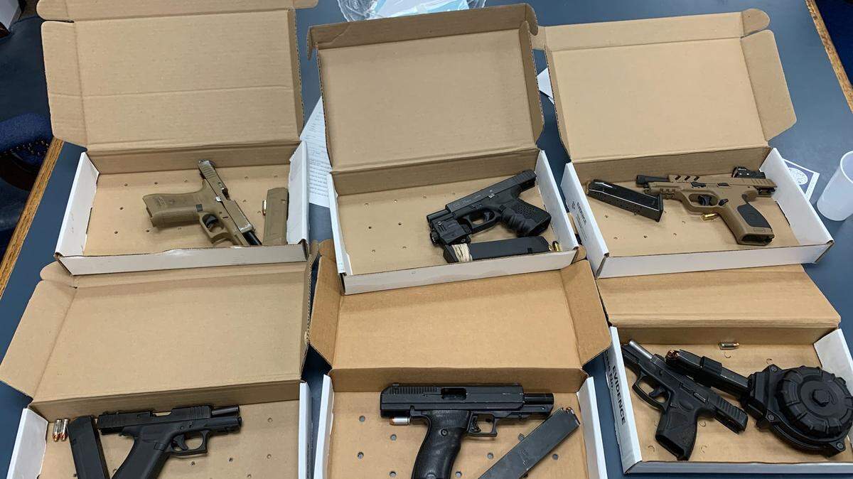 Guns seized during an Illinois State Police enforcement blitz in 2022.