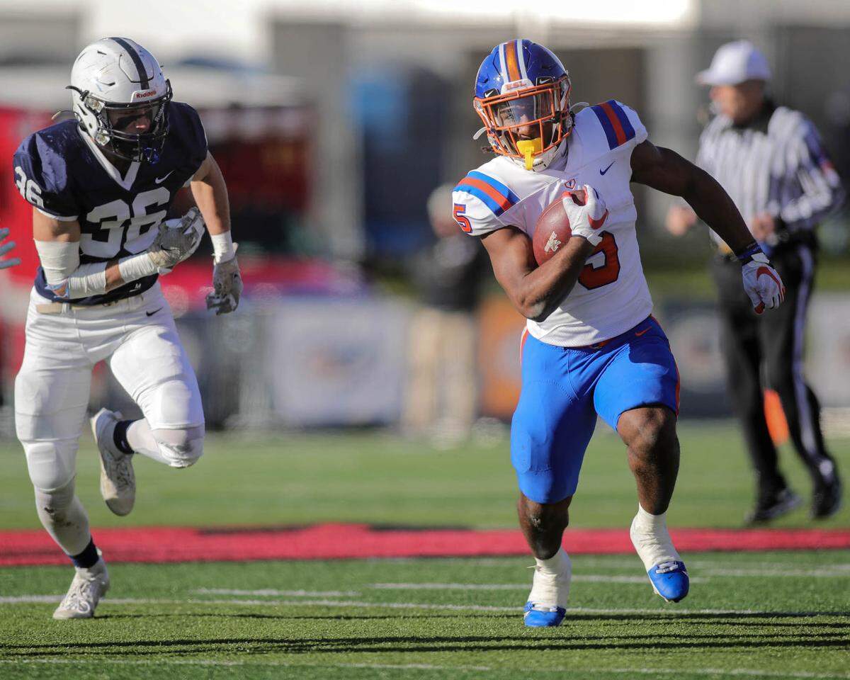 November 25, 2023 - Normal, IL - East St.Louis runningback Larevious Woods (5) carries the ball during the first half of SaturdayÕs IHSA 6A, State Championship game between East St. Louis and Cary (Grove) on the campus of Illinois State University. [Photo: Chris Johns]