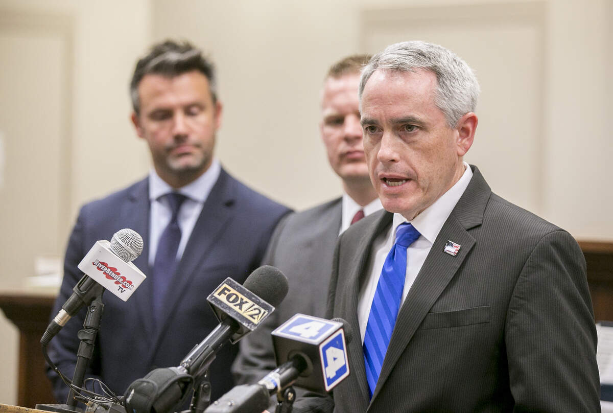 The Illinois Attorney General’s Office will take over an investigation into corruption in Madison County government. State’s Attorney Tom Gibbons, right, earlier had created a task force to look into allegations of corruption.