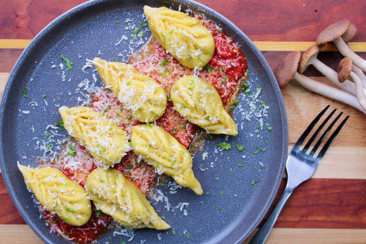 Culurgiones filled with roasted baby potatoes, black poplar mushrooms and parmigiana served over scratch tomato sauce and finished with cave aged tomme was a recent meatless Monday pasta special offered at Marco’s Express.