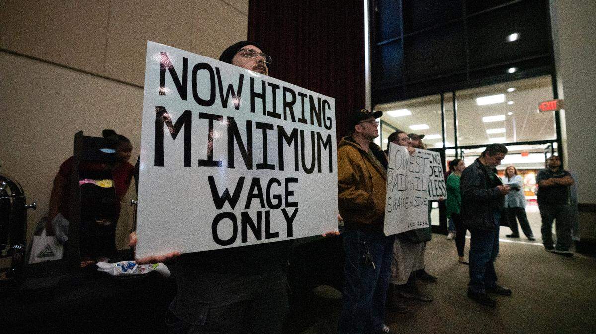 Protestors in support of SIUE employees and members of Local 2887 show during a protest on Nov. 2, 2023, in Edwardsville, Ill.