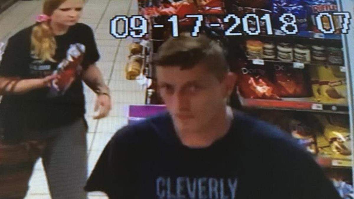 Police are looking for the man pictured, who they say stole a license plate from a parked car Monday morning.