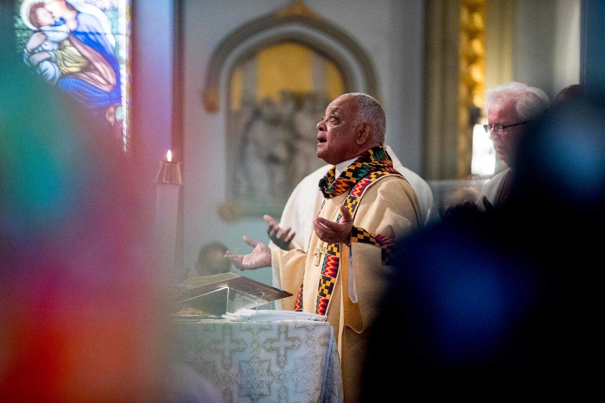 Cardinal Wilton D. Gregory holds Mass in 2019, less than two weeks after he was installed as bishop of Washington.