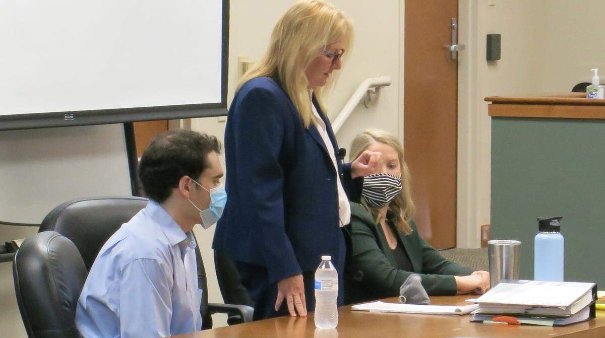 Timothy Banowetz, left, listens to Public Defender Mary Copeland announce on Tuesday morning that he has agreed to plead guilty to the murder of Edwardsville attorney Randy Gori. Assistant Public Defender Delani Hemmer sits at right in a courtroom at the Madison County Criminal Justice Center.
