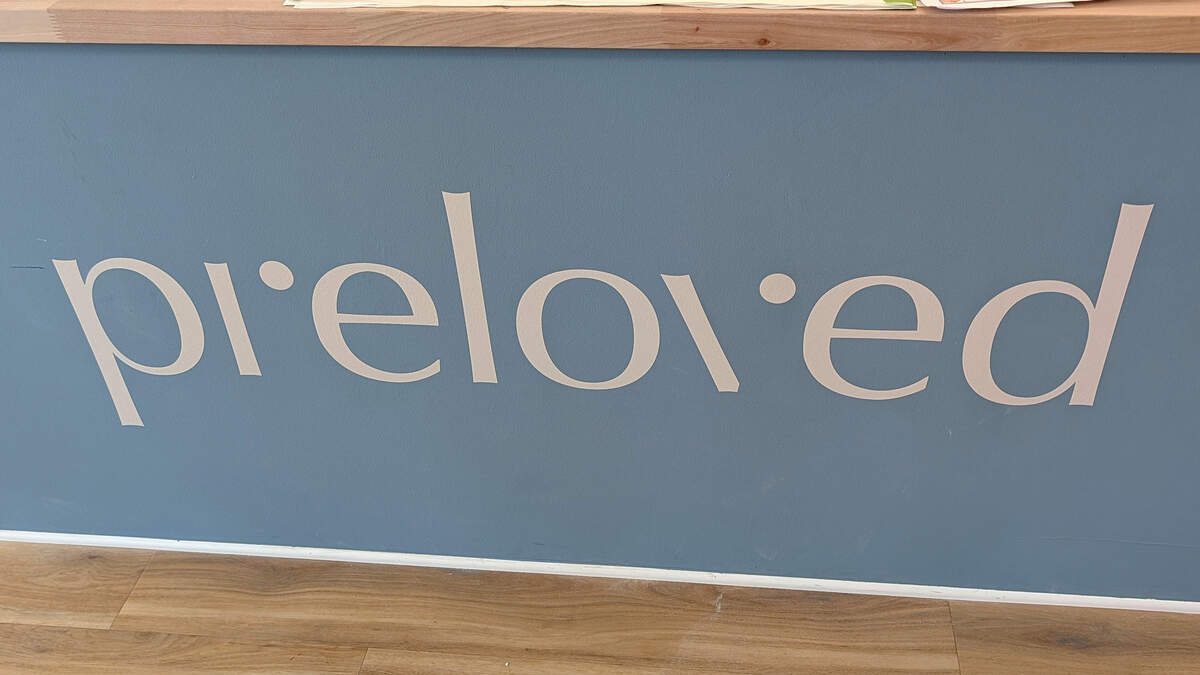 Decals and other signage were installed throughout the new O'Fallon store days before its opening.