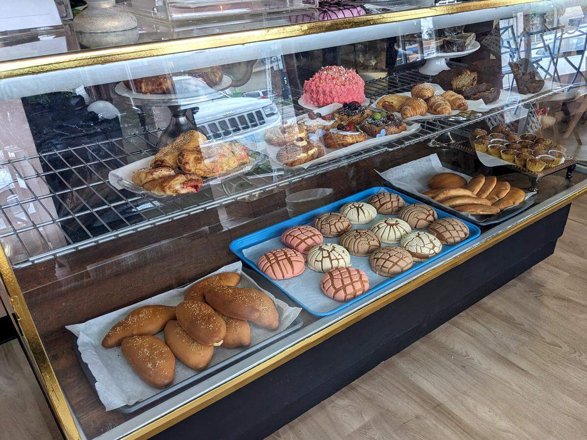 The pastry case full of baked goods at Azúcar in Collinsville