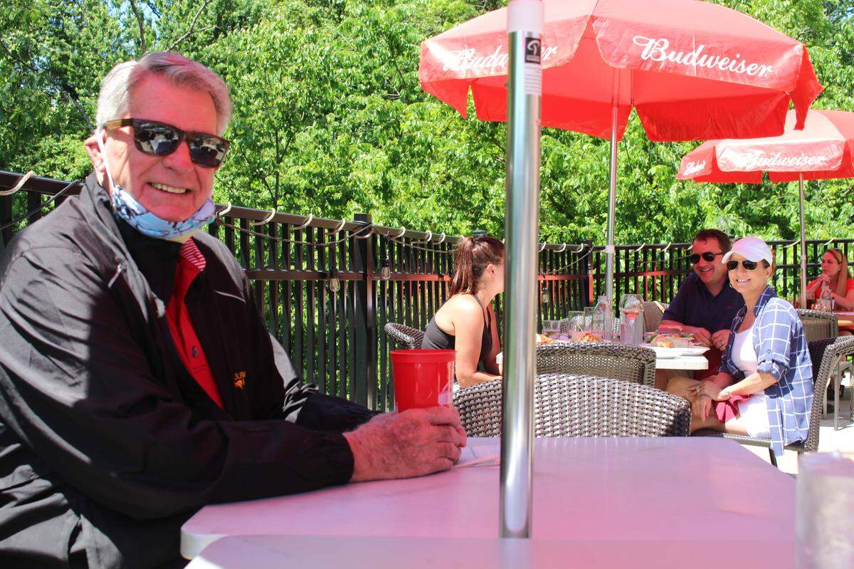 St. Louis Cardinals radio broadcaster and former player Mike Shannon hangs out on the patio of one of his restaurants, Mike Shannon’s Grill in Edwardsville, on Friday.