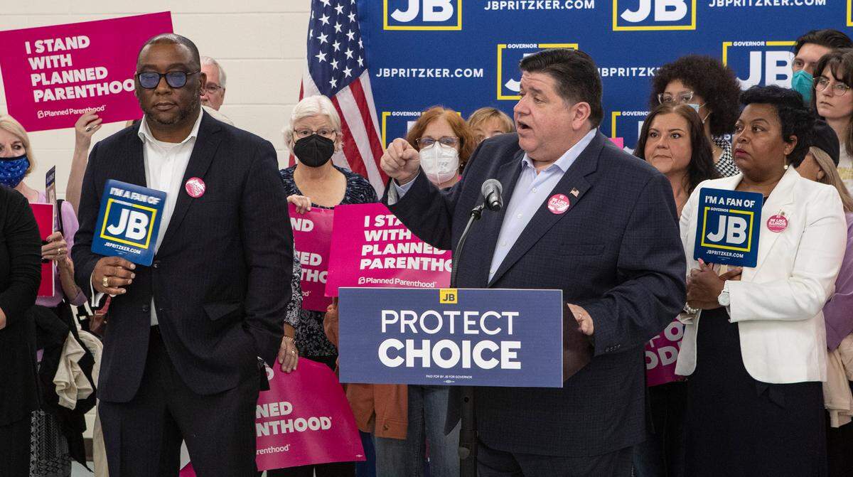 Illinois Gov. J.B. Pritzker is joined by Democratic legislators, abortion rights advocates and other supporters at a pro-choice rally at the Ironworkers Local 396 office in East St. Louis. Pritzker, Senate President Don Harmon and House Speaker Emanuel “Chris” Welch issued a joint statement Tuesday saying the planned special session to respond to the overturning of Roe vs. Wade has been postponed, possibly until the fall.