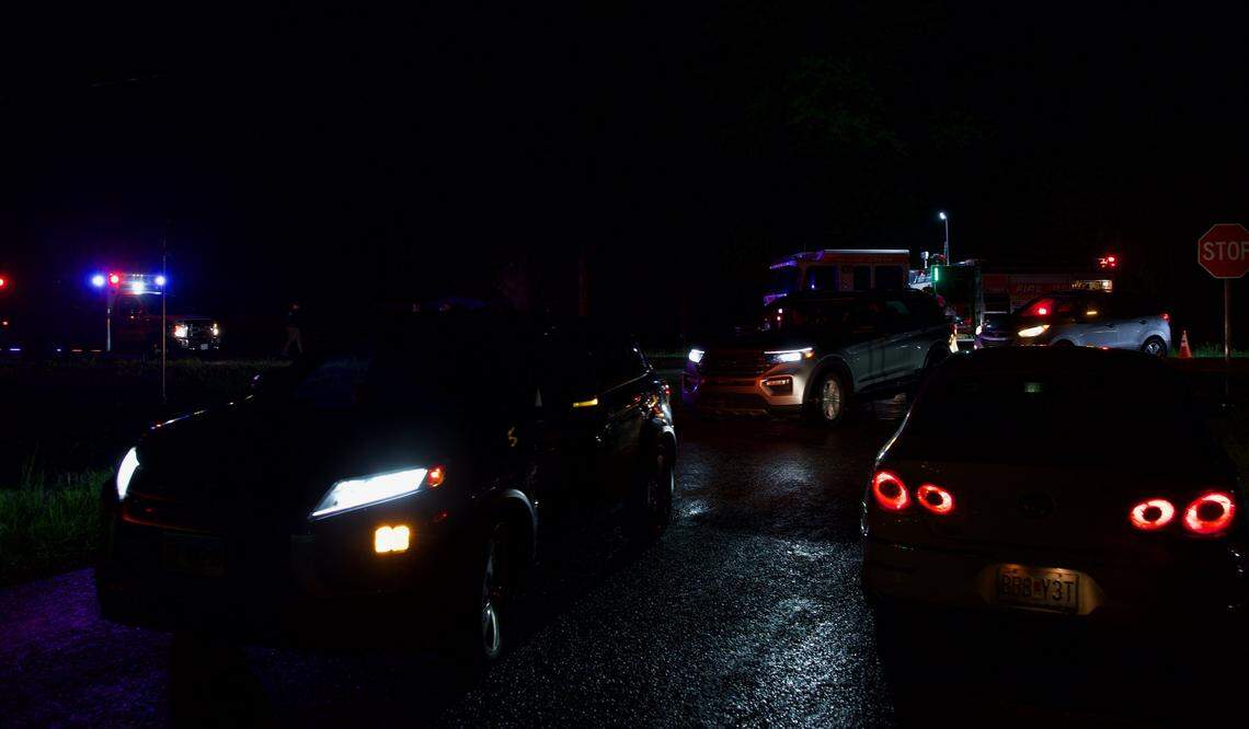 Traffic is diverted from Illinois 160 as first responders attend to storm damage south of Trenton in Clinton County Monday night.